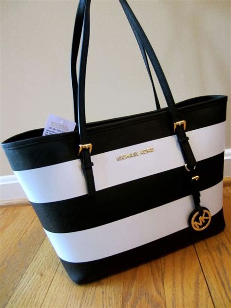 michael kors purse black with white leather strip|Michael Kors purses small black.